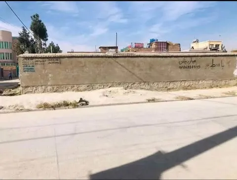 Walled corner land for sale, 300 m², Milli Township, behind new Interior Ministry
