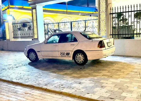 Mercedes-Benz W202 1995 white, yellow interior